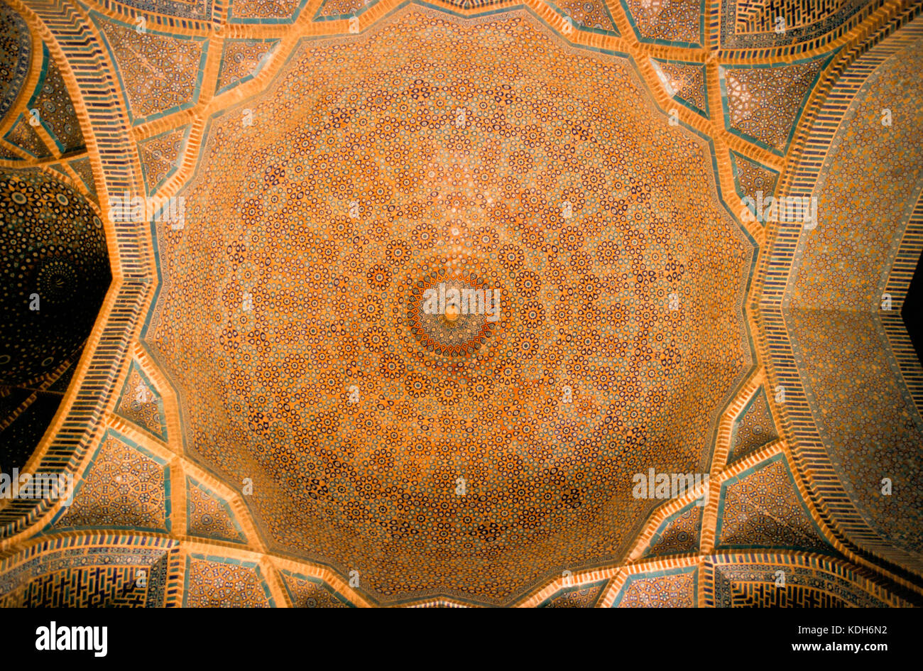 Intricate tilework and art decorate the interior of the dome at the Shah Jehan Mosque, Thatta, Pakistan Stock Photo