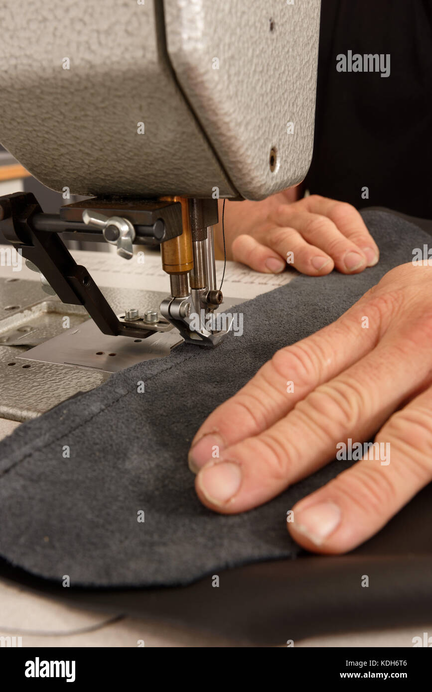 sewing machine machines needle needles sew thread stitch stitching Stock Photo