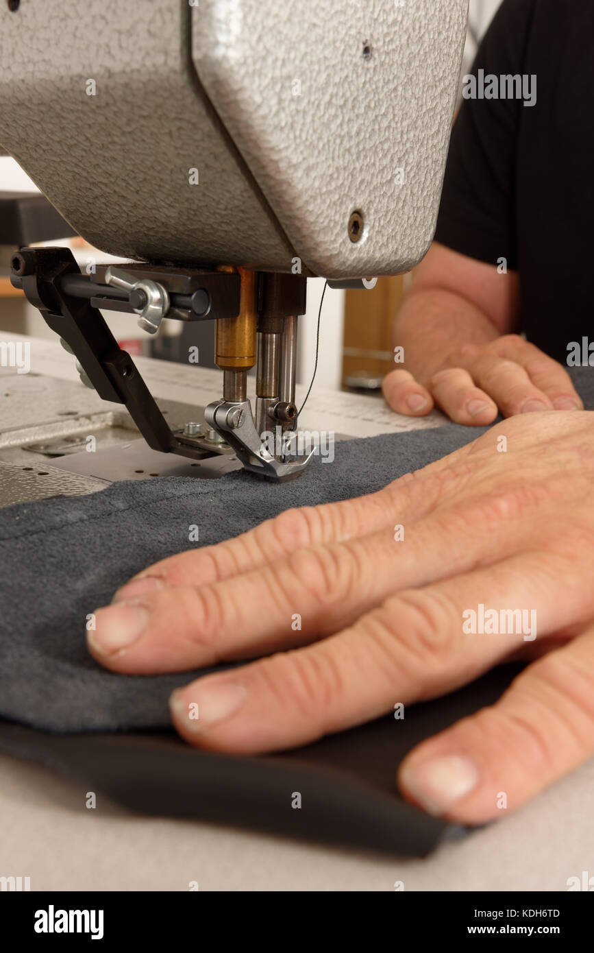 sewing machine machines needle needles sew thread stitch stitching Stock Photo