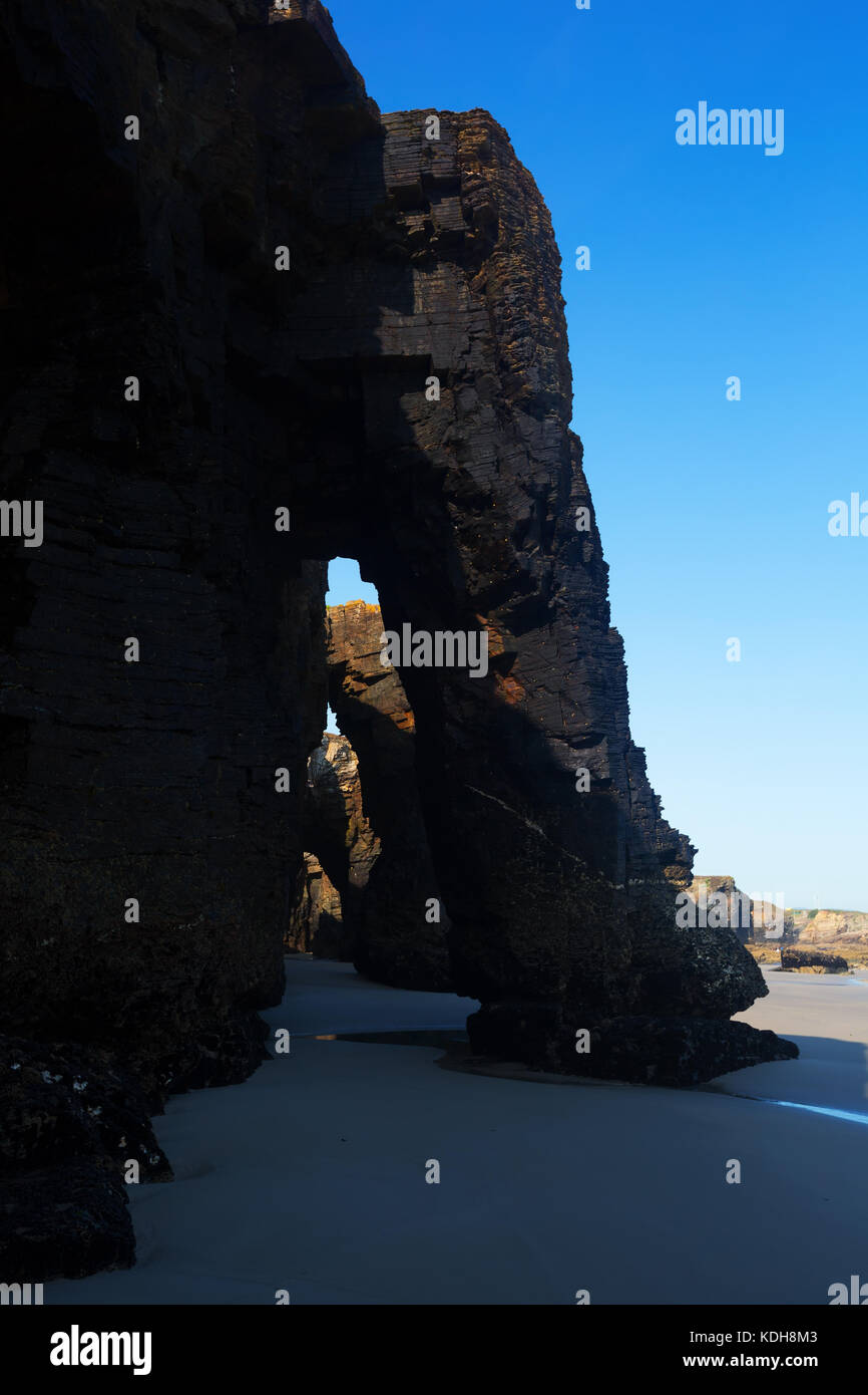 Natural Arch In Rocks At As Catedrais Beach In Low Tide. Atlantic Ocean 