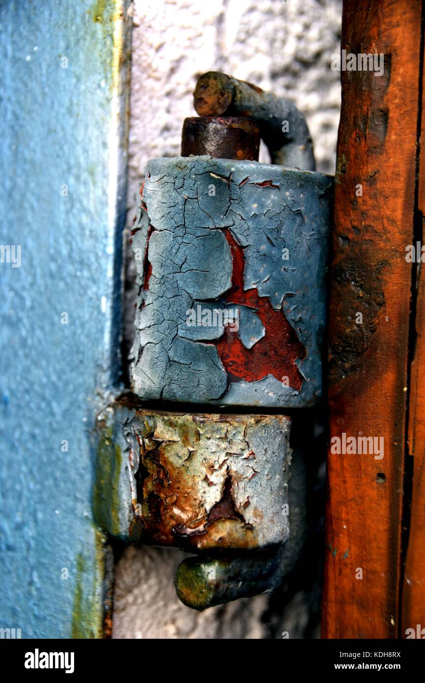 closeup of rusty door hinge with peeled paint Stock Photo Alamy