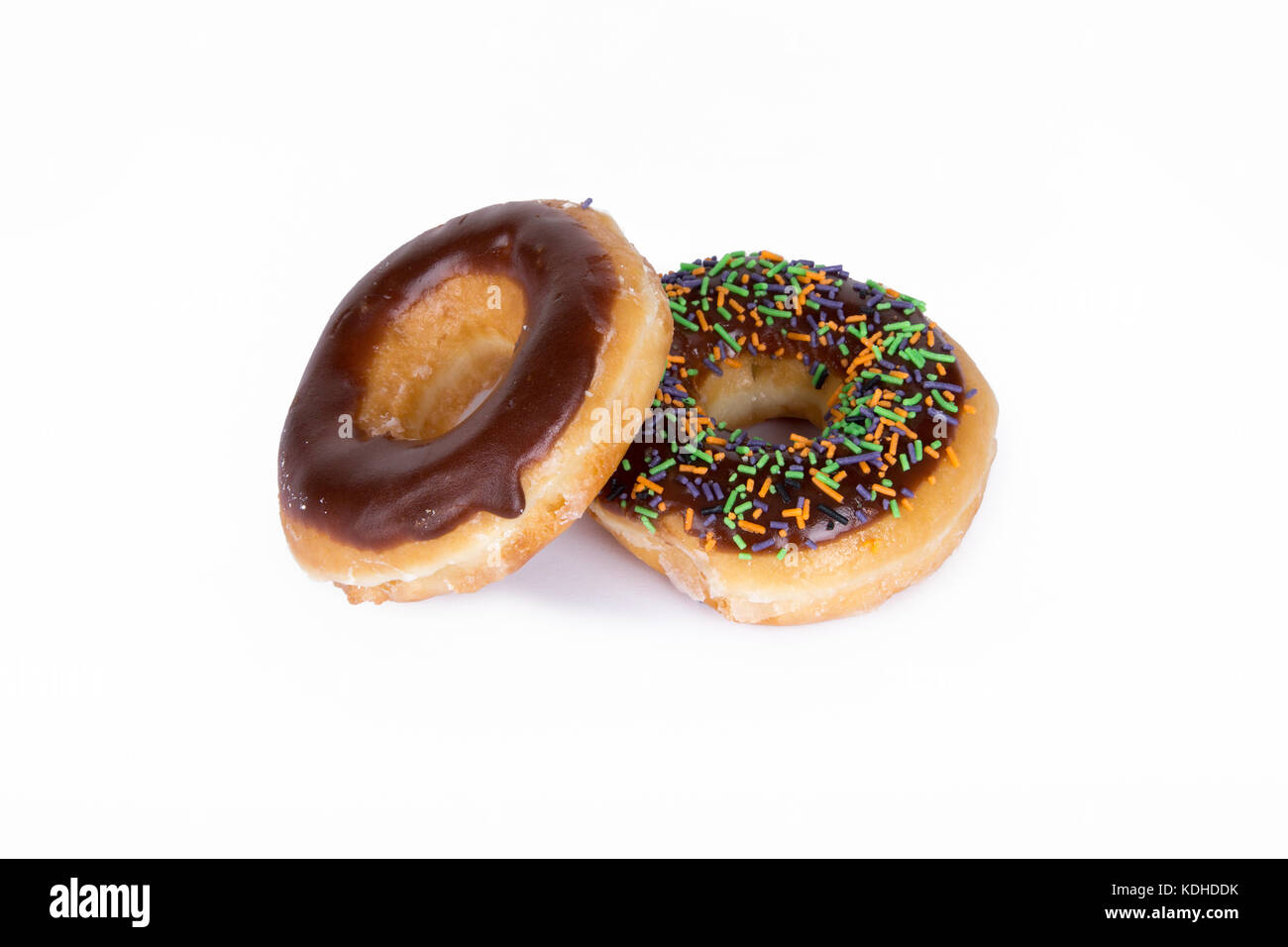 Close up detailed top view of yummy donuts with chocolate, powdered ...