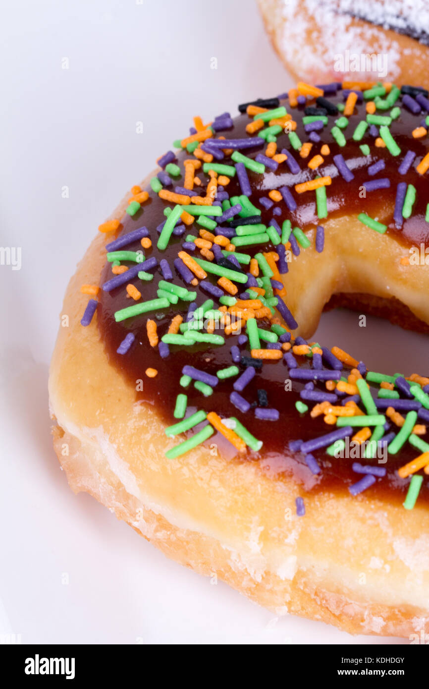 Close up detailed view of yummy donut with colorful sweets on Stock ...
