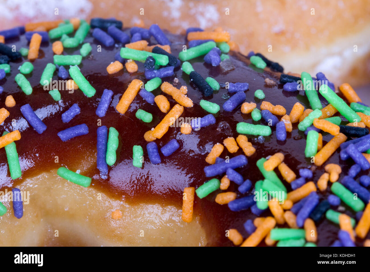 Close up detailed view of yummy donut with colorful sweets on Stock ...