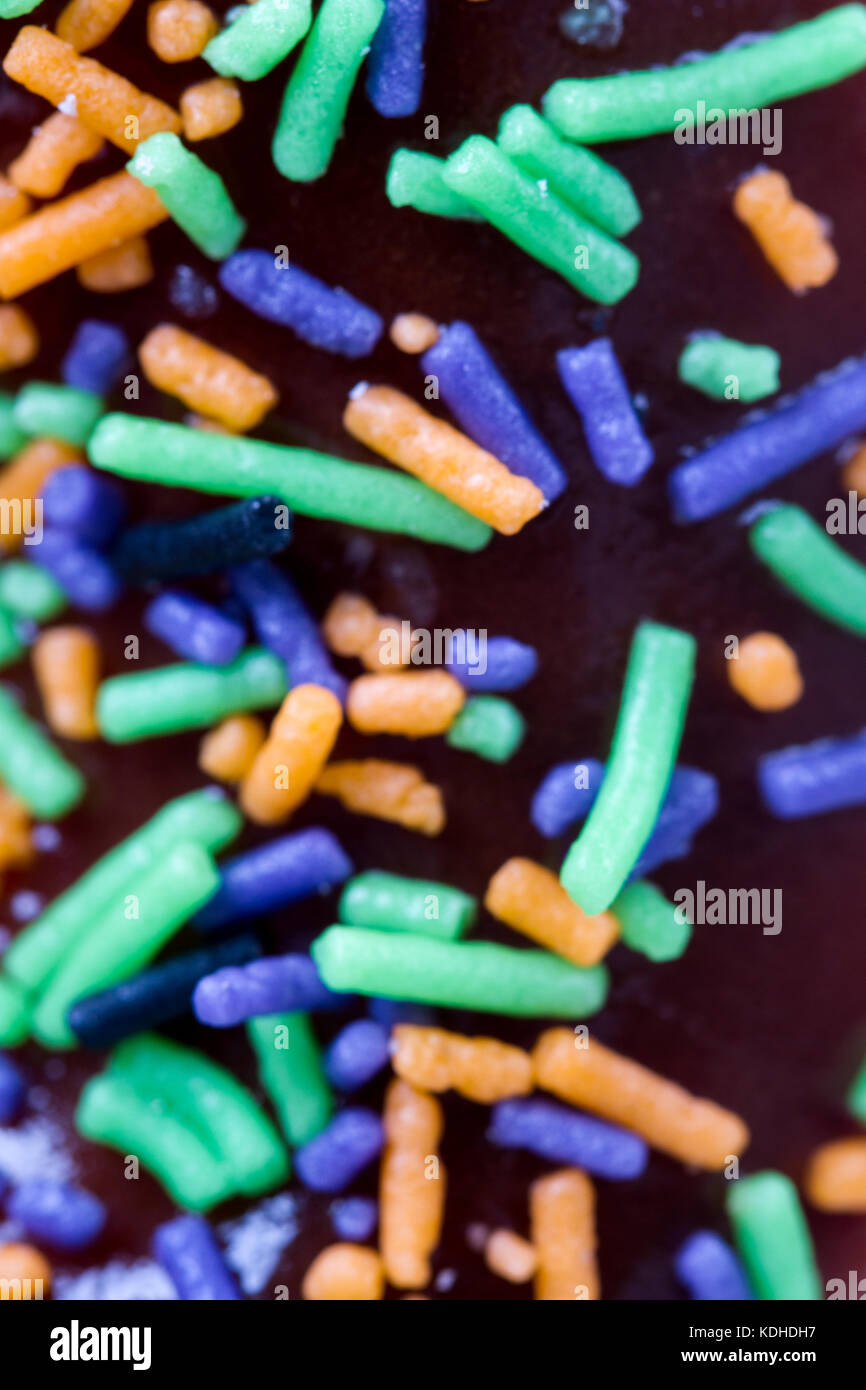 Close up detailed view of yummy donut with colorful sweets on Stock ...