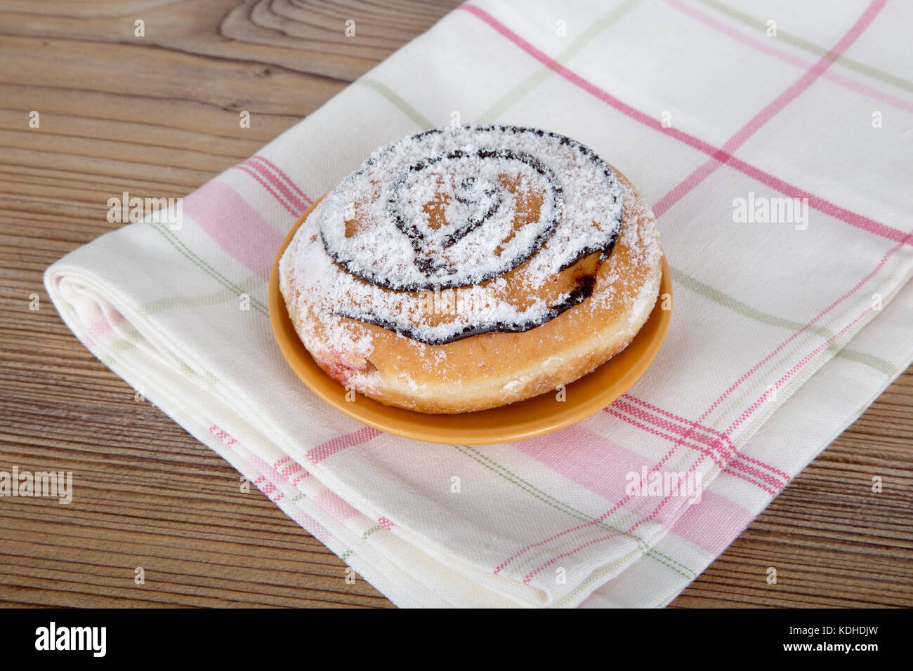 Close up detailed view of yummy donuts with chocolate, powdered sugar ...