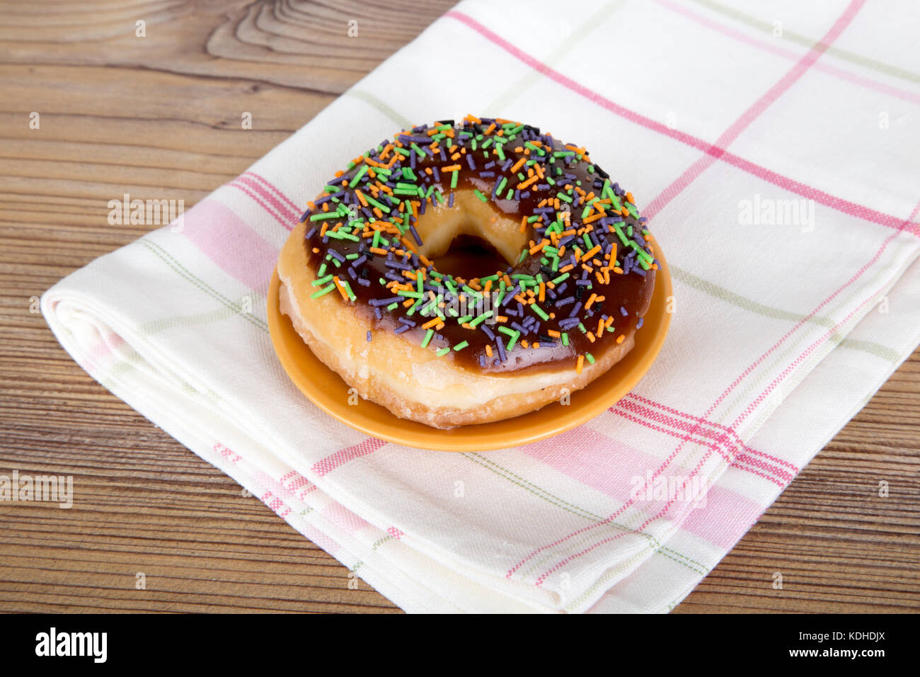 Close up detailed view of yummy donuts with chocolate, powdered sugar ...