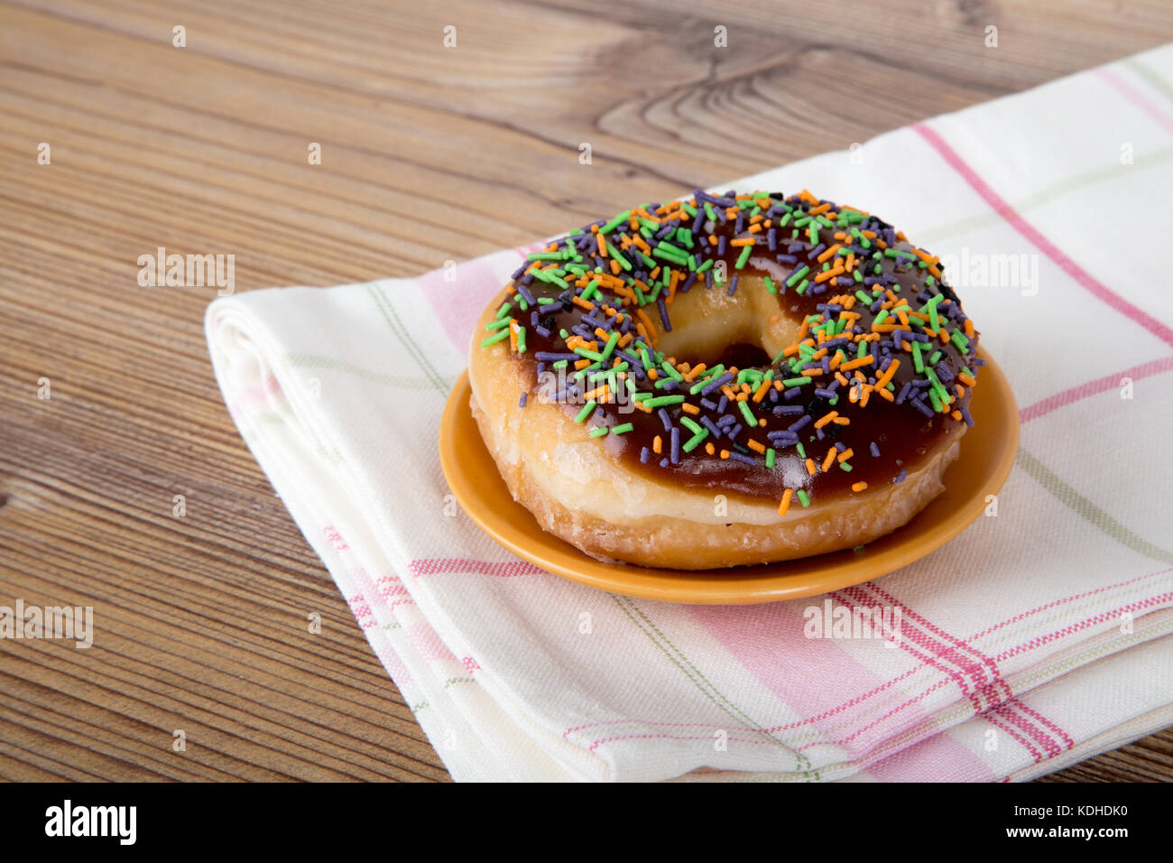 Close up detailed view of yummy donuts with chocolate, powdered sugar ...