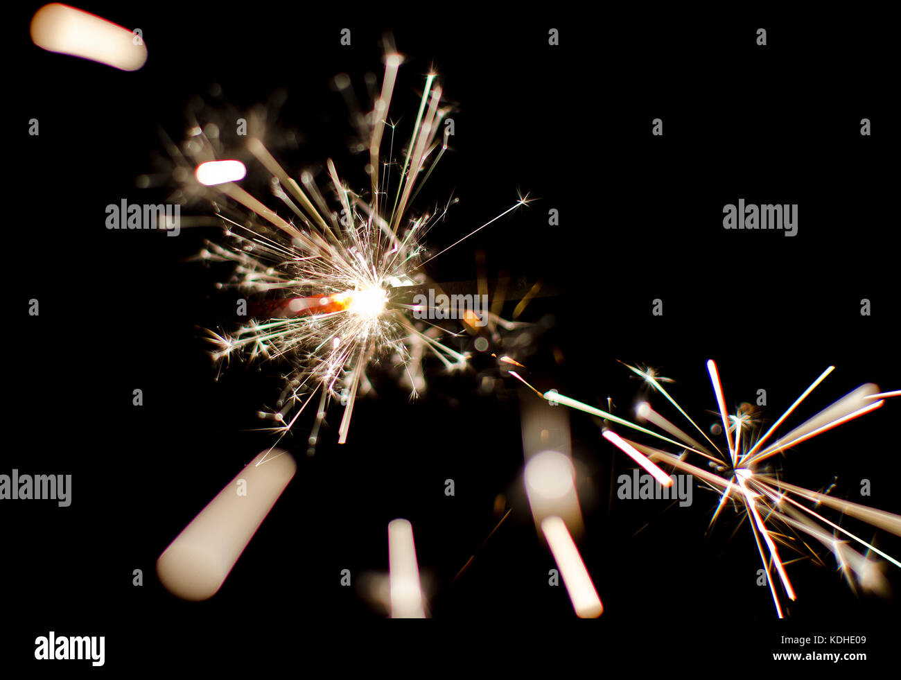 Celebration Fireworks Over City at Night Stock Photo