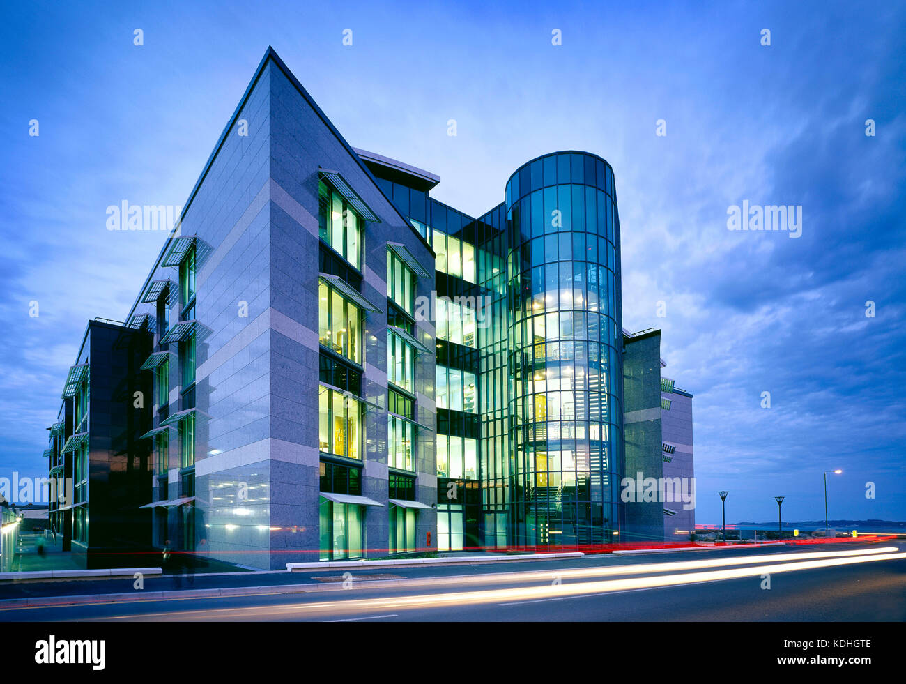 Architecture. Modern commercial building at dusk. Admiral Park Financial District. Saint Peter Port. Guernsey. Stock Photo