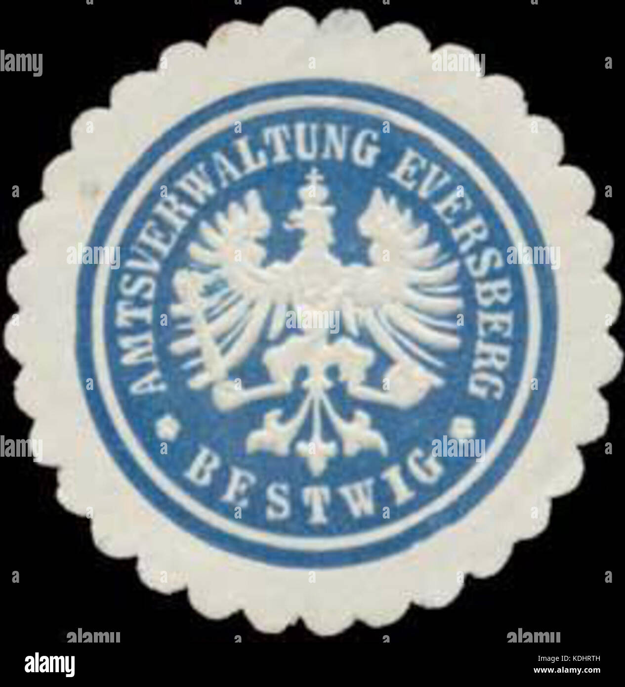 This stamp, known as a Siegelmarke, is associated with the administrative office of Eversberg in Bestwig. It provides insight into postal or official documentation from the area. Stock Photo