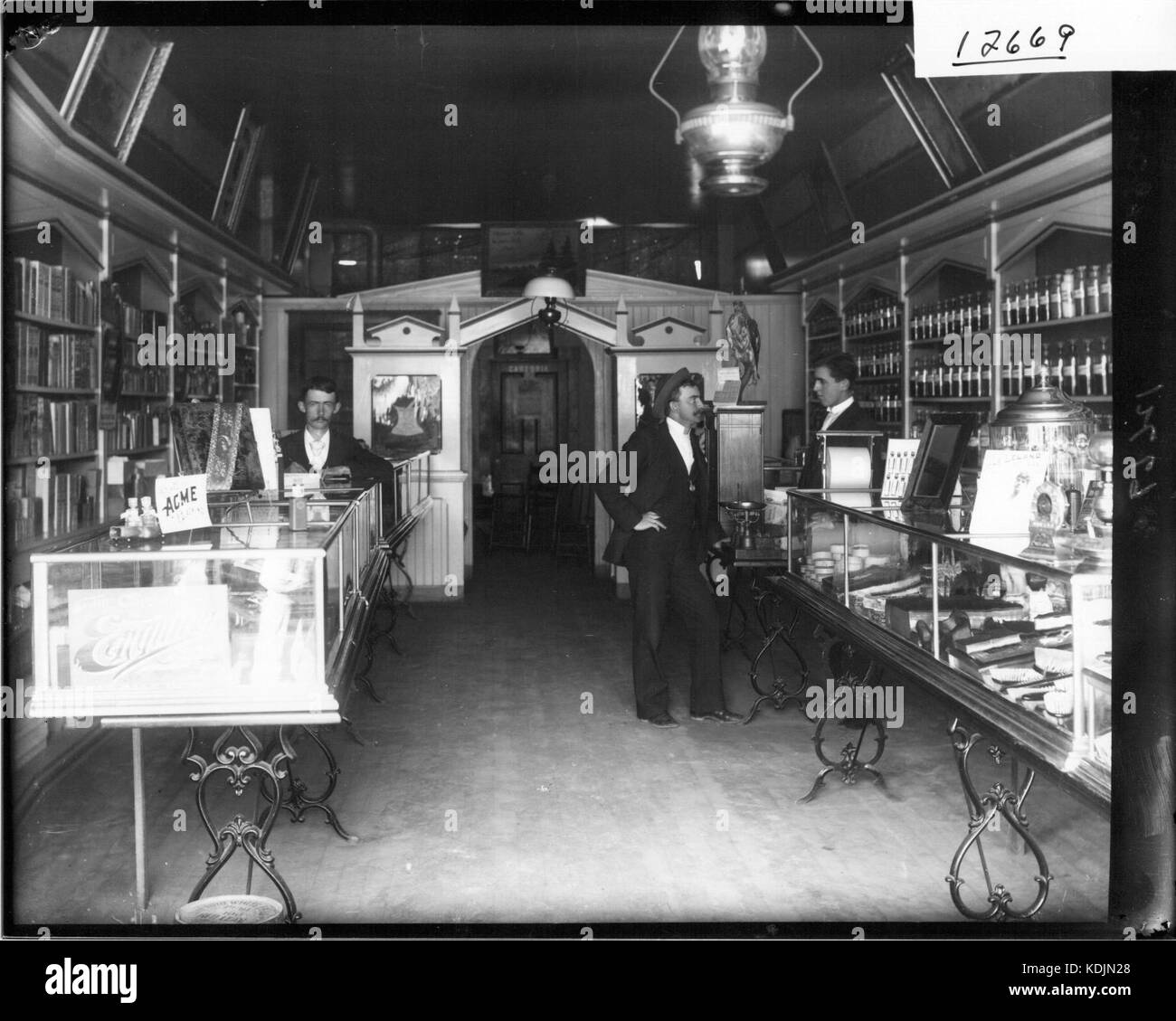 Men inside Oxford Drug Store 1913 (3190725711) Stock Photo
