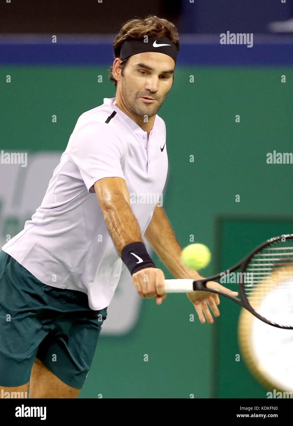 Shanghai, China. 14th Oct, 2017. Roger Federer of Switzerland hits a return during the singles semifinal match against Juan Martin del Potro of Argentina at 2017 ATP Shanghai Masters tennis tournament in Shanghai, east China, on Oct. 14, 2017. Credit: Fan Jun/Xinhua/Alamy Live News Stock Photo