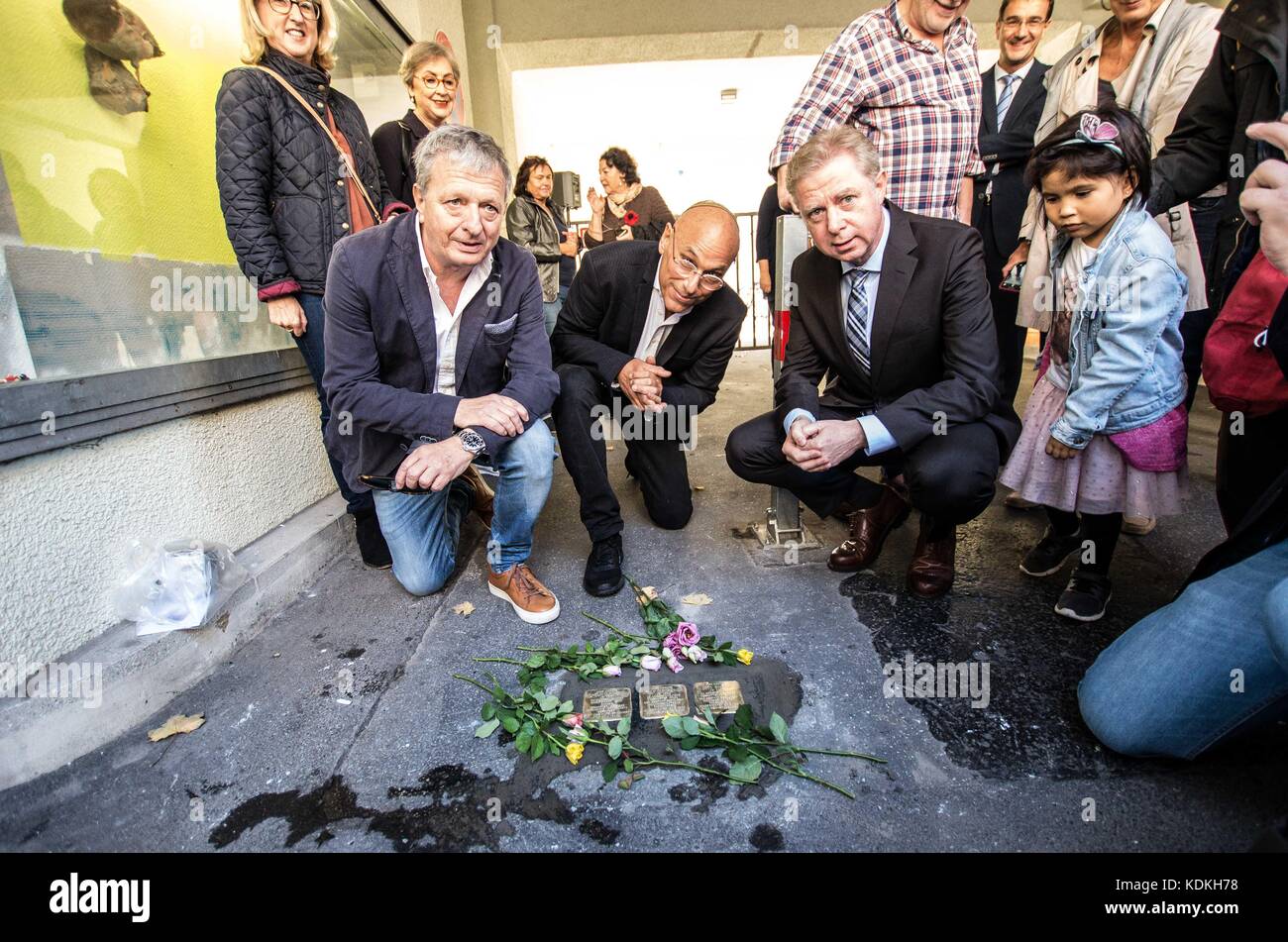 Munich, Bavaria, Germany. 14th Oct, 2017. Terry Swartzberg. Despite lengthy battles, the so-called Stolpersteine ('Stumbling Blocks'') containing the names & information of victims of National Socialism were installed at four different sites in Munich. The City of Munich forbid the installation of the memorial stones on public ground in 2015, which led the Stolpersteine Initiative (''˜Stumbling Block Initiative'') to seek private properties to install them. To date, 61,000 Stolpersteine in 2,000 cities in 21 countries have been dedicated, with much criticism lobbed against Munich's Stock Photo