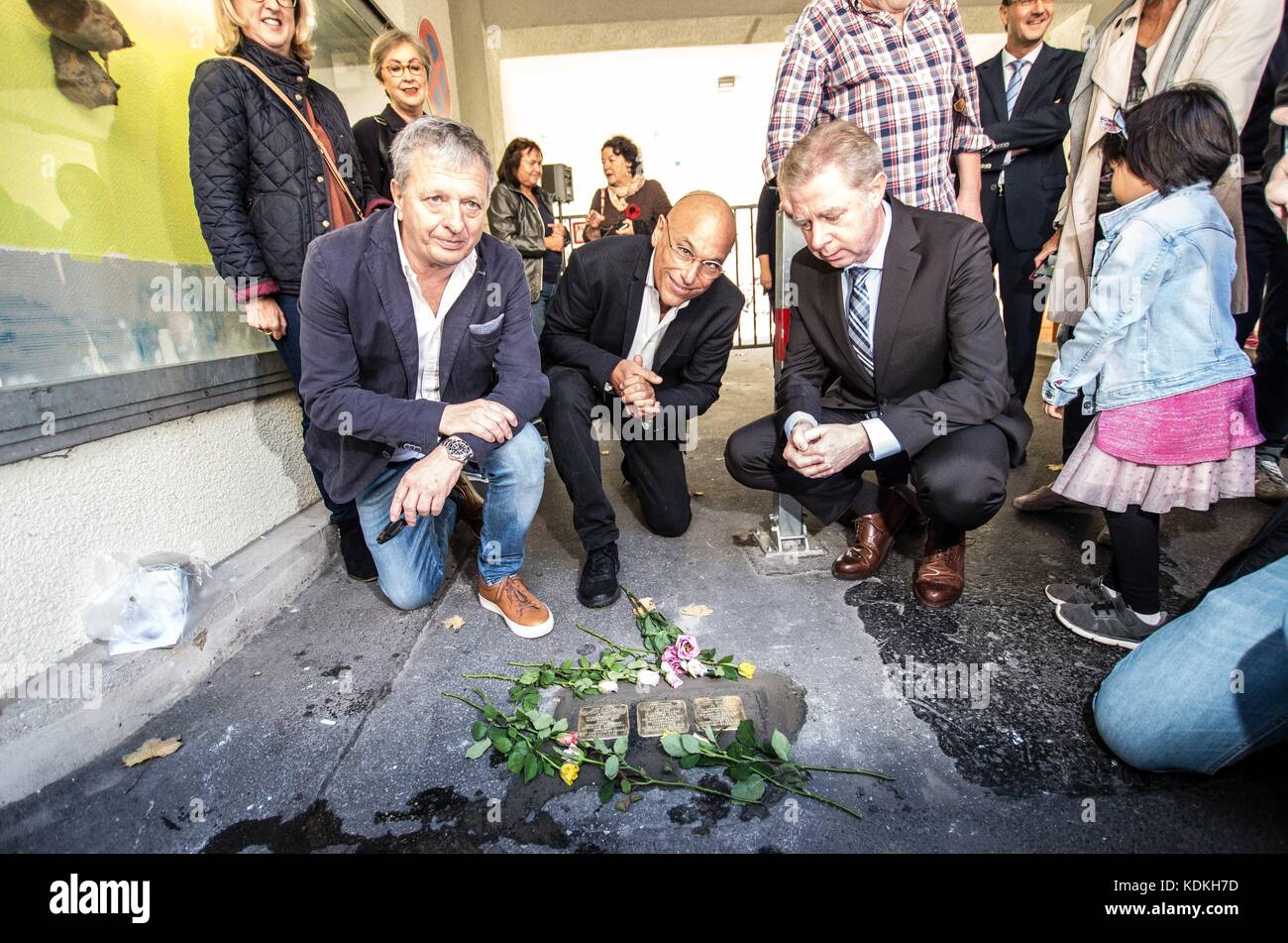 Munich, Bavaria, Germany. 14th Oct, 2017. Terry Swartzberg. Despite lengthy battles, the so-called Stolpersteine ('Stumbling Blocks'') containing the names & information of victims of National Socialism were installed at four different sites in Munich. The City of Munich forbid the installation of the memorial stones on public ground in 2015, which led the Stolpersteine Initiative (''˜Stumbling Block Initiative'') to seek private properties to install them. To date, 61,000 Stolpersteine in 2,000 cities in 21 countries have been dedicated, with much criticism lobbed against Munich's Stock Photo