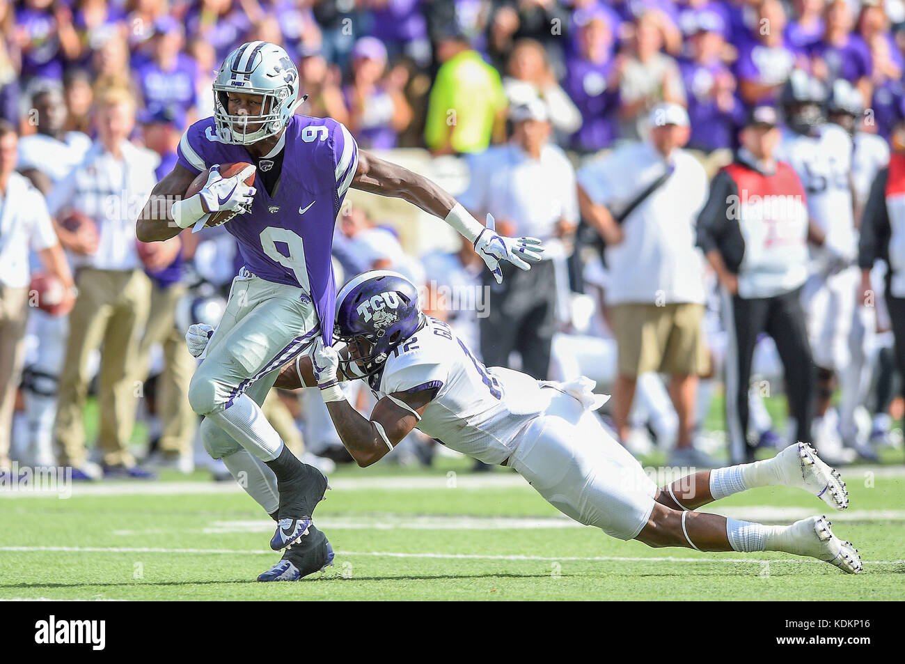 Manhattan, Kansas, USA. 14th Oct, 2017. TCU Horned Frogs cornerback Jeff Gladney (12) tries to drag Kansas State Wildcats wide receiver Byron Pringle (9) to the ground after a big gain during the NCAA Football Game between the TCU Horned Frogs and the Kansas State Wildcats at Bill Snyder Family Stadium in Manhattan, Kansas. Kendall Shaw/CSM/Alamy Live News Stock Photo