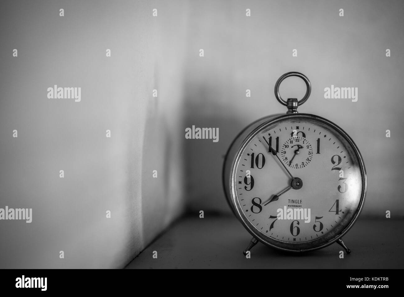 An antique clock on a ledge Stock Photo Alamy