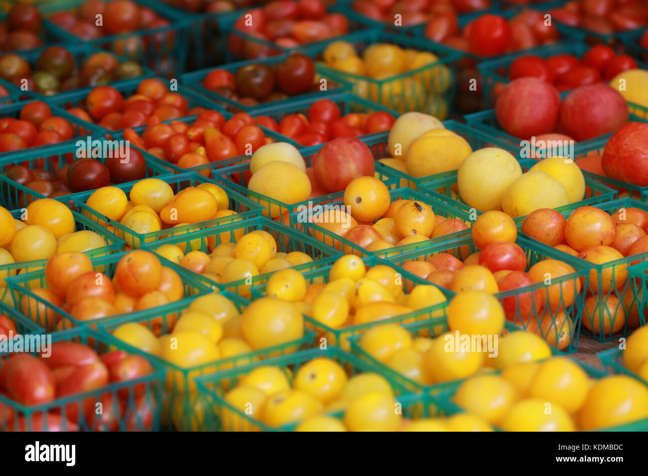 Cherry tomatoes in a farmers market Stock Photo - Alamy