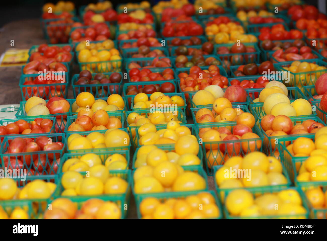 Cherry tomatoes in a farmers market Stock Photo - Alamy