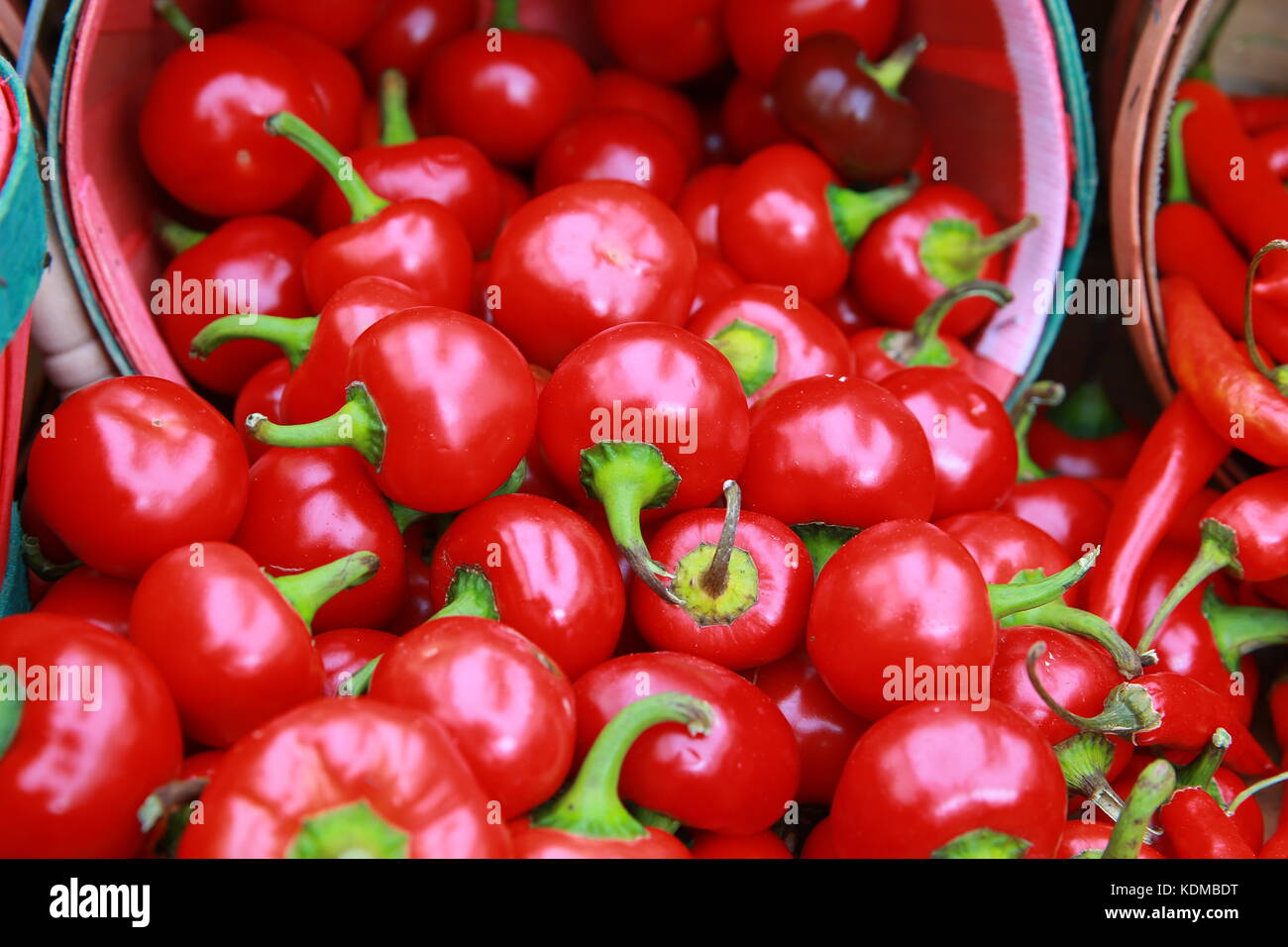 Red peppers in a farmers market Stock Photo - Alamy