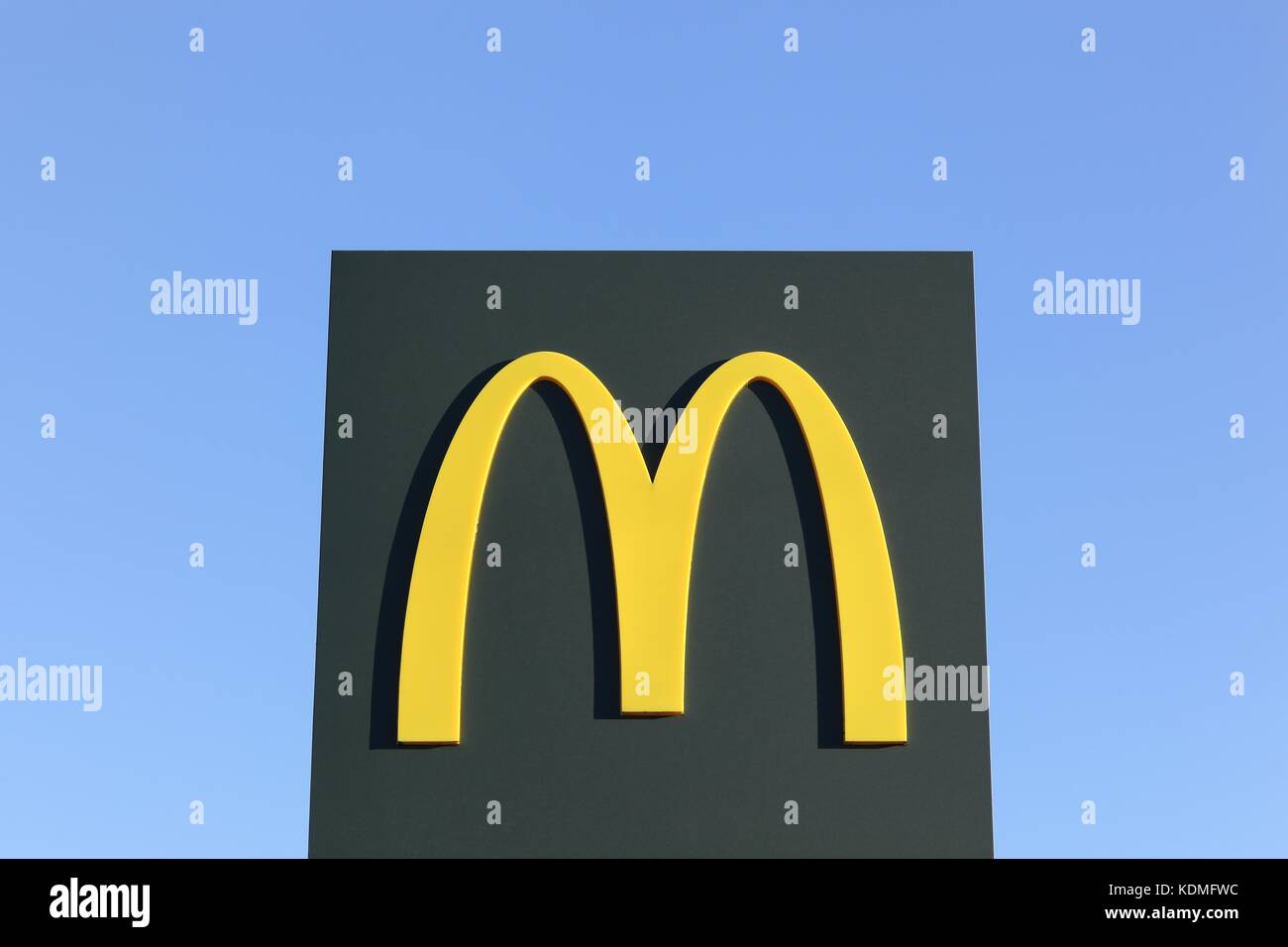Horsens, Denmark - November 26, 2015: McDonald's logo. McDonald's is the world's largest chain of hamburger fast food restaurants. Stock Photo