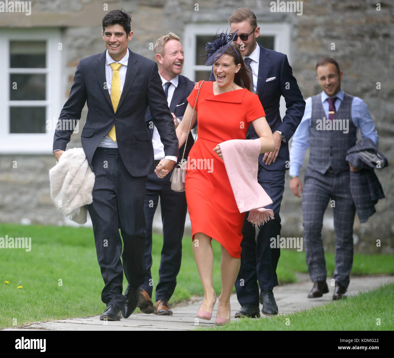 England cricket player Alastair Cook (front left) with his wife Alice, and  Paul Collingwood (rear, left) and Stuart Broad (rear, right) arrive at St  Mary the Virgin, East Brent, Somerset, for the