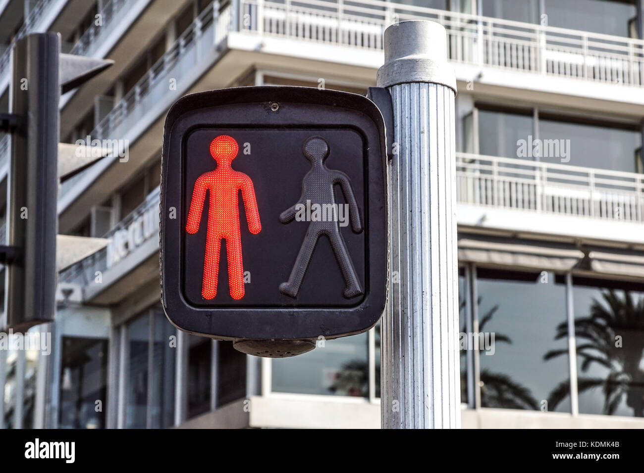 Red traffic light, for pedestrians on the street Stock Photo