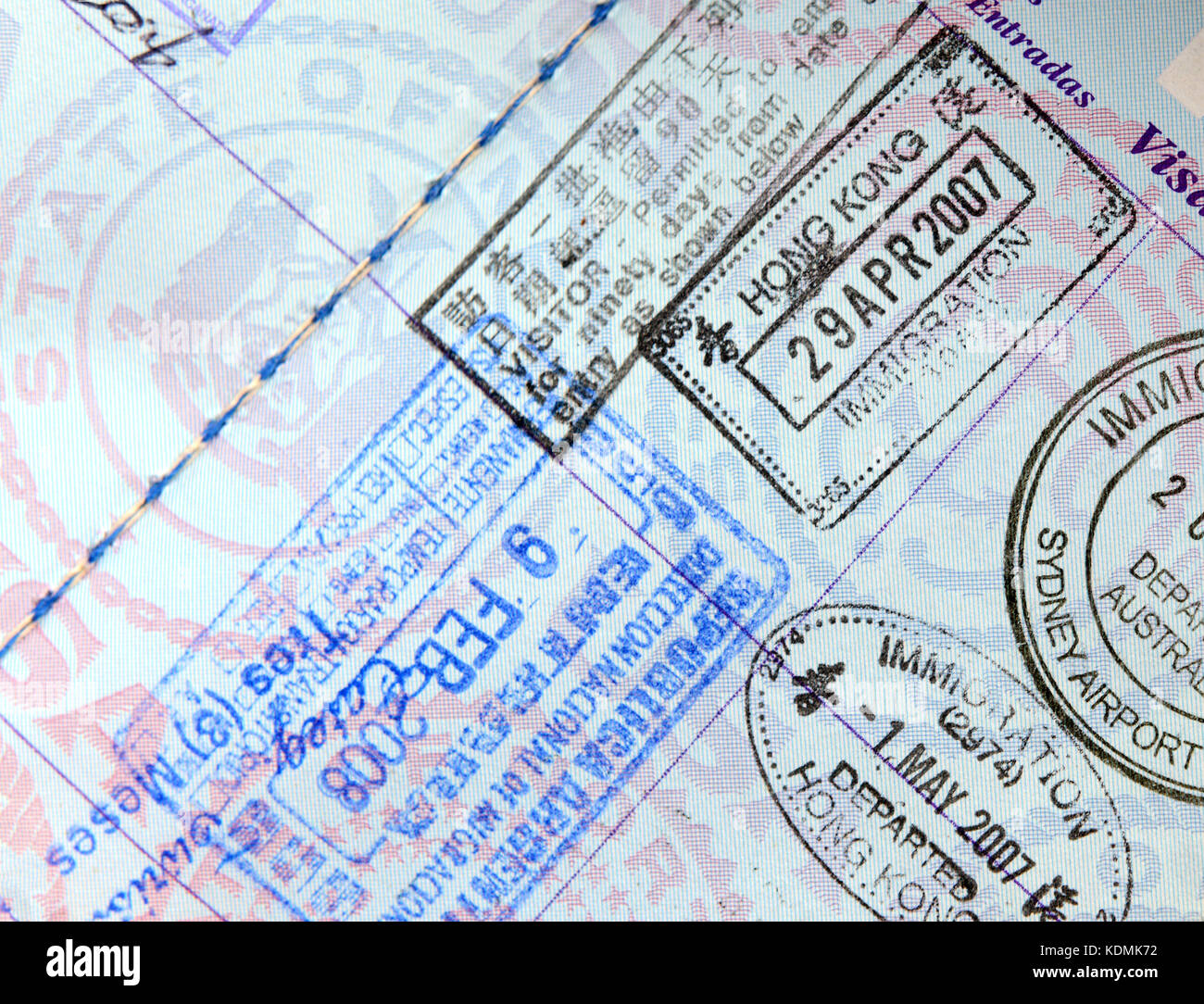 Closeup of Immigration stamps in Passport showing travel concept Stock Photo
