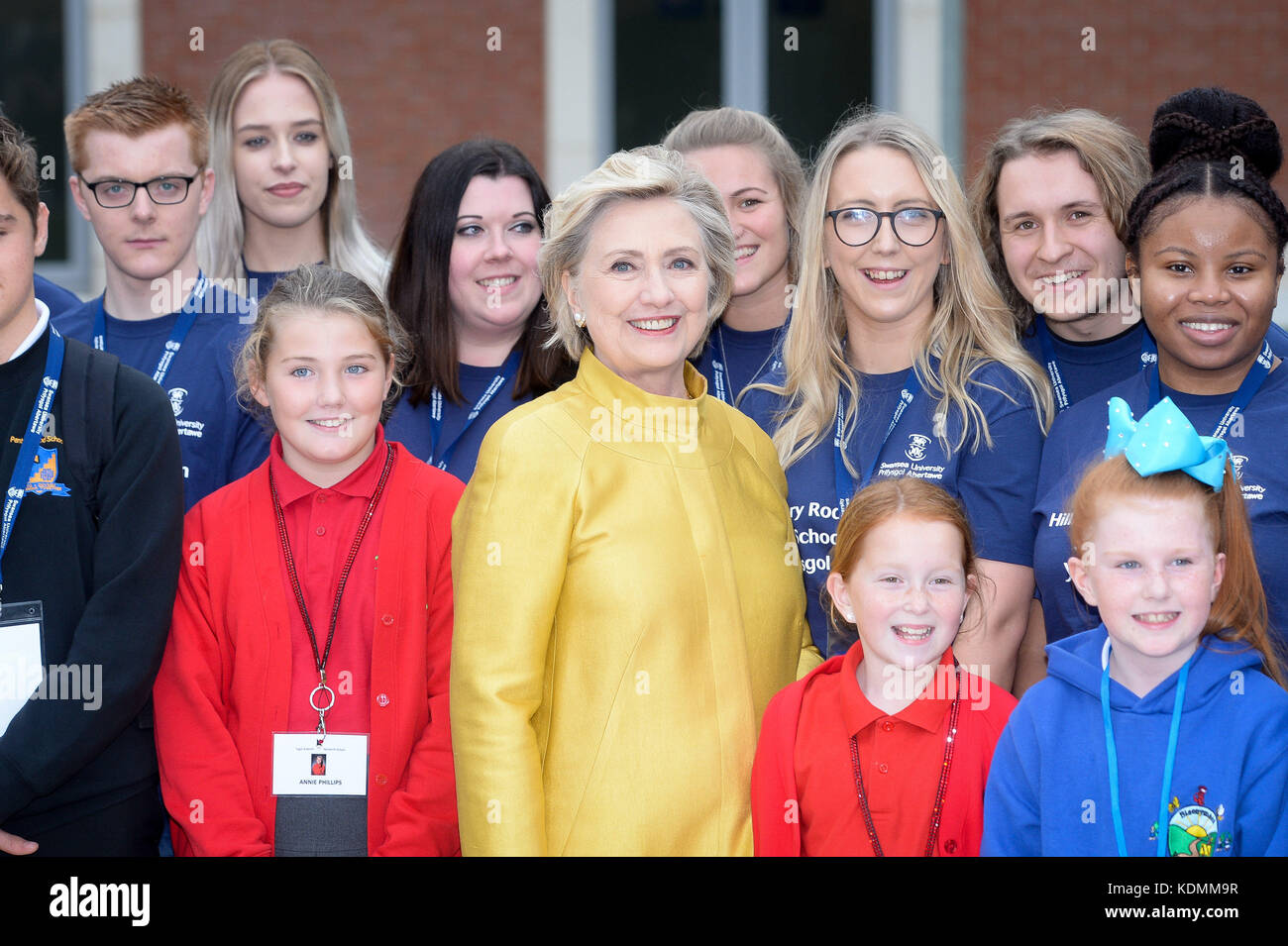 Hillary Clinton poses for a group shot with children from Narberth School, Pentrehafod School and Blaen-y-Maes School, as she receives a Honorary Doctorate, at Swansea University, in recognition of her commitment to promoting the rights of families and children around the world, a commitment that is shared by Swansea University's Observatory on the Human Rights of Children and Young People. Stock Photo