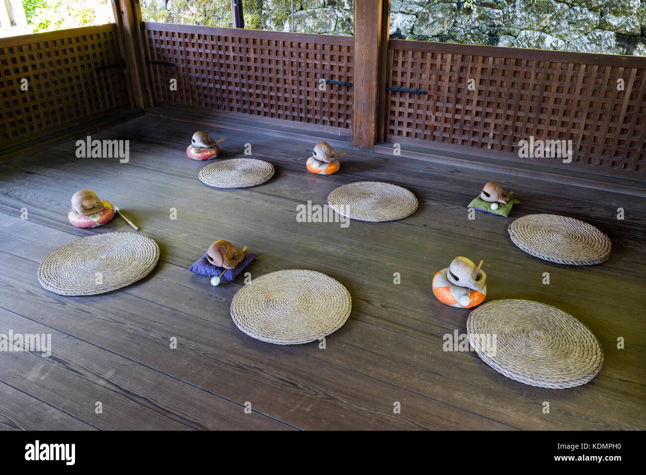 Kyoto, Japan - May 19, 2017: Room with traditional zen buddhist wooden fish gongs, Mokugyo and pillows to perform meditation Stock Photo