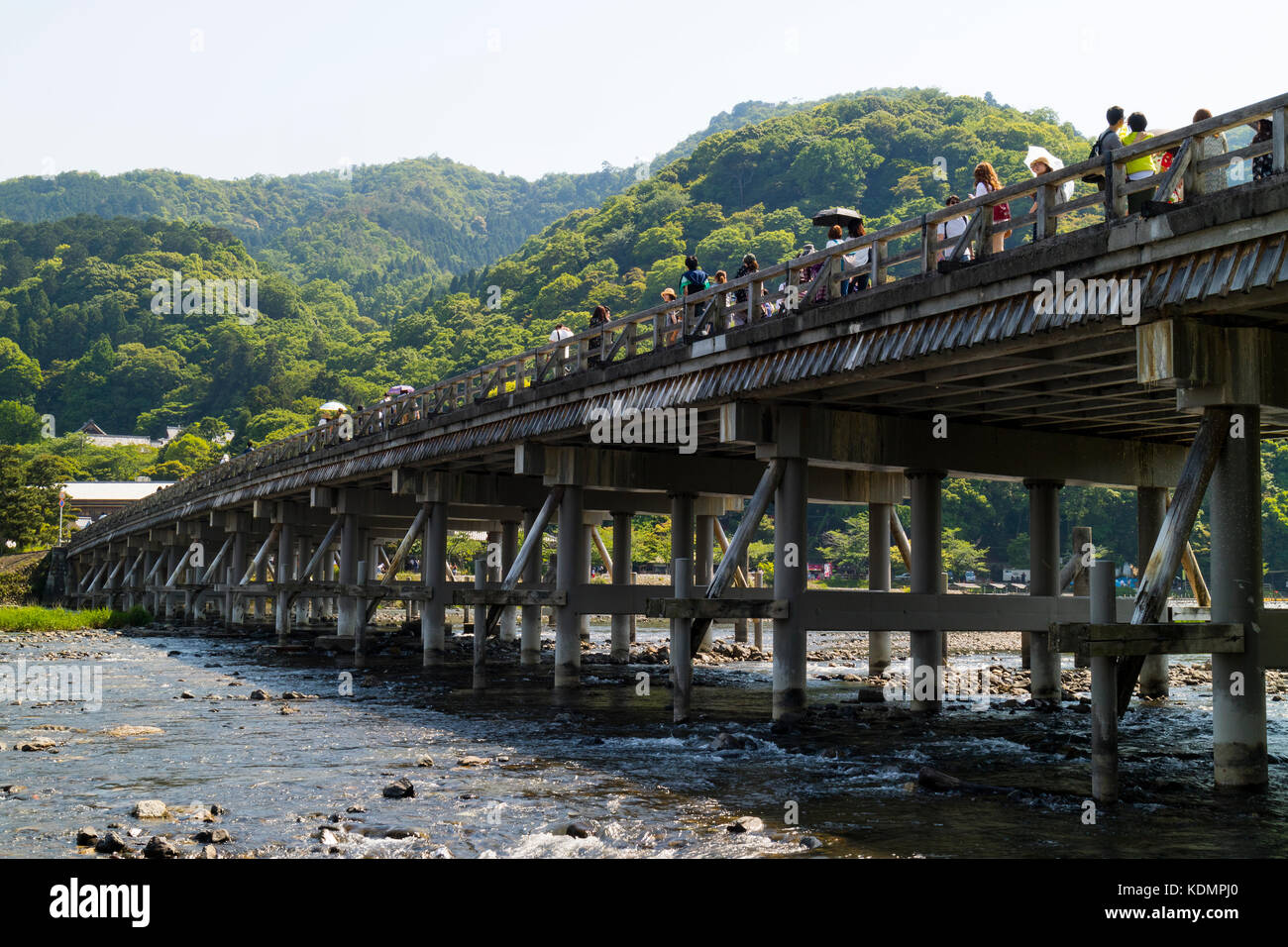 Kyoto, Japan - May 20, 2017:  Historical Togetsukyo Bridge over the Katsura River at Otsuki, Yamanashi, Japan Stock Photo