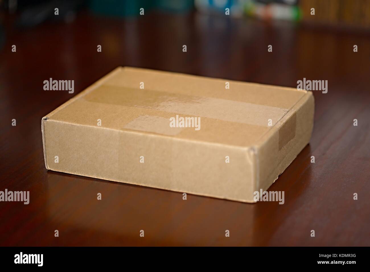 Cardboard Box on a Table Stock Photo