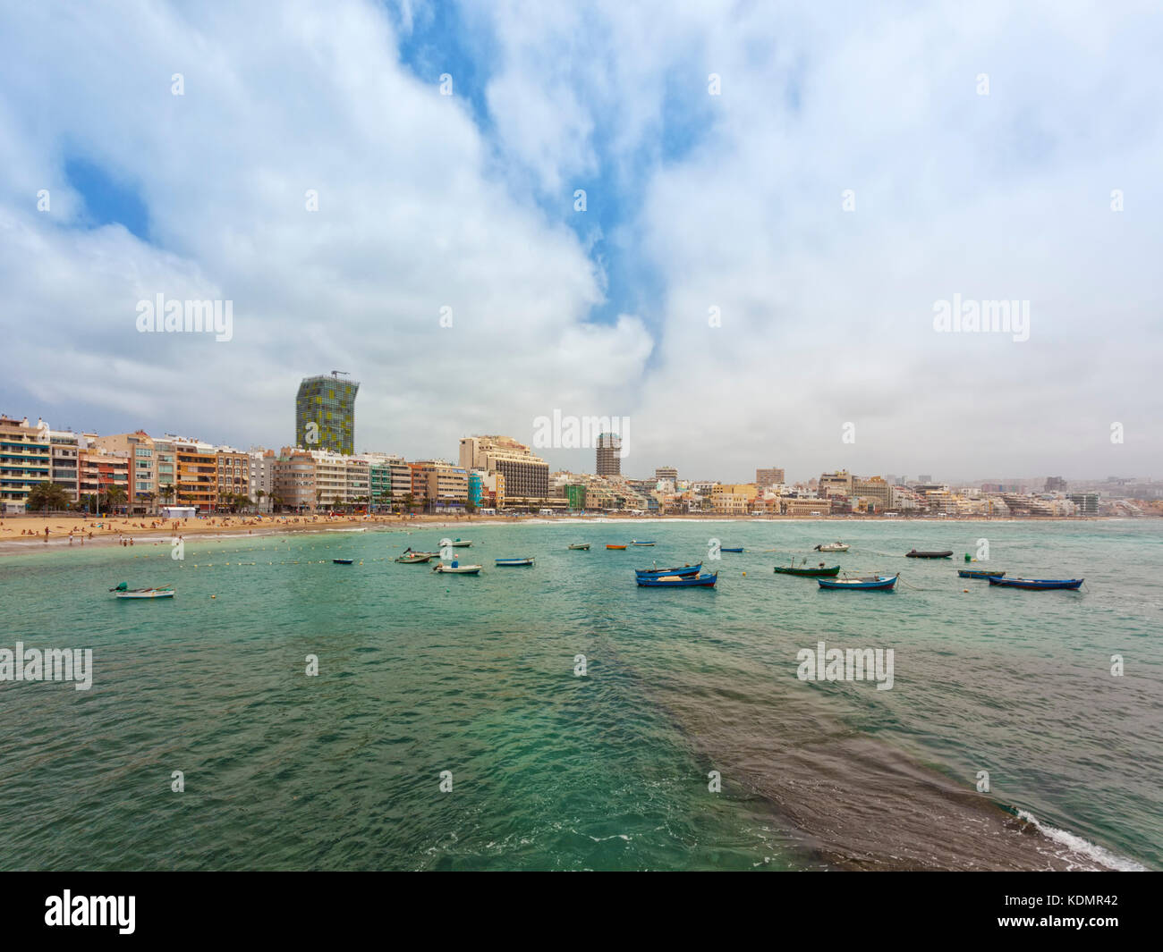 Waterfront of Las Palmas, capital of grand Canary, with Playa de Las Canteras beach, fishing boats i foreground Stock Photo
