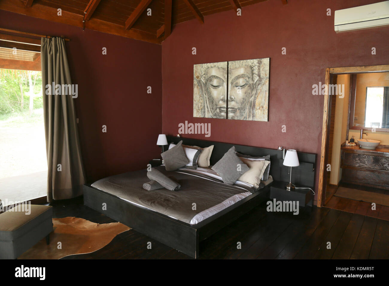 interior of a Bedroom of a luxury tropical bungalow. Union Island, St.Vincent & Grenadines, Caribbean Stock Photo