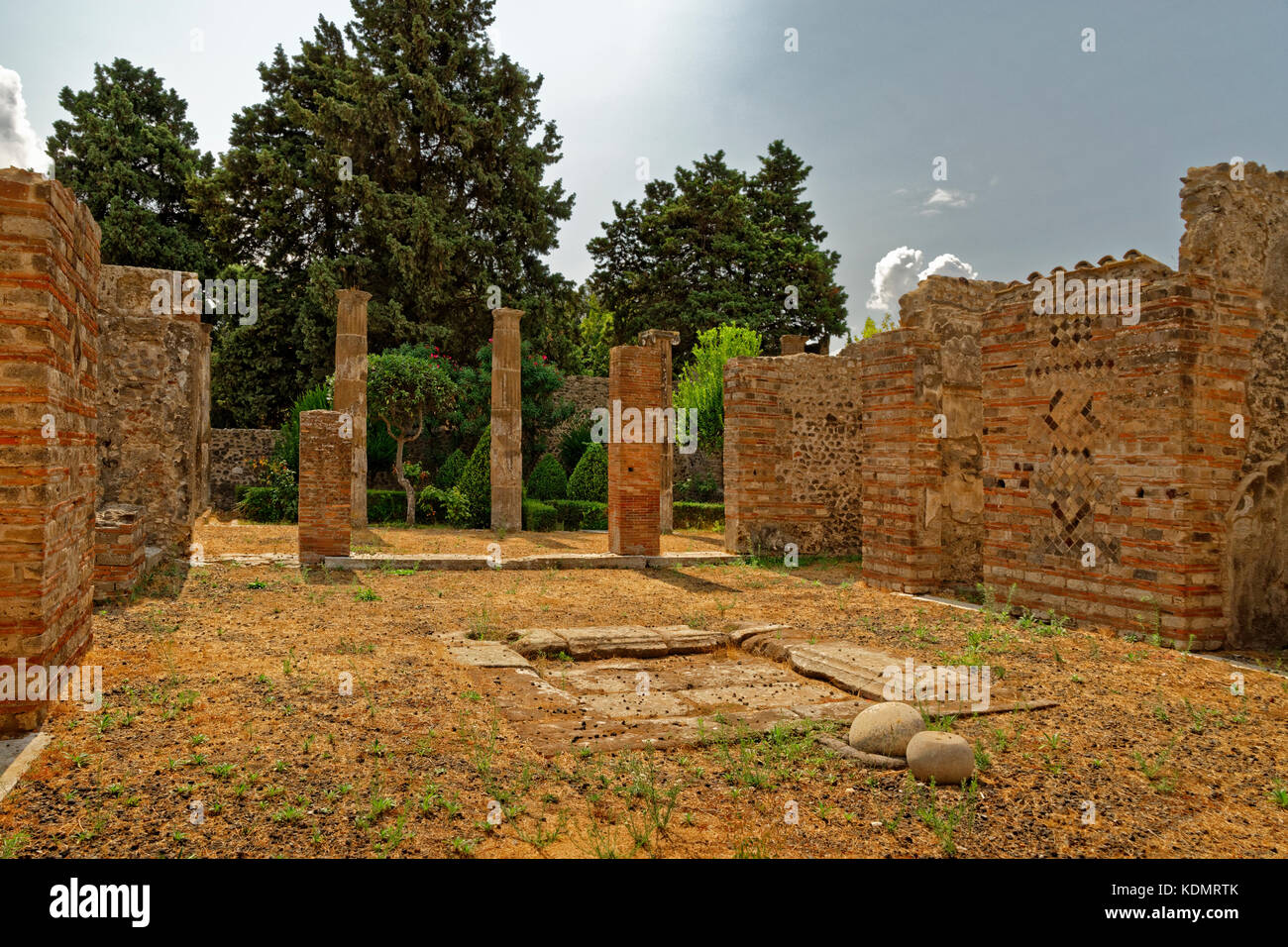 Villa courtyard in the ruined Roman city of Pompeii at Pompei Scavi, near Naples, Southern Italy. Stock Photo