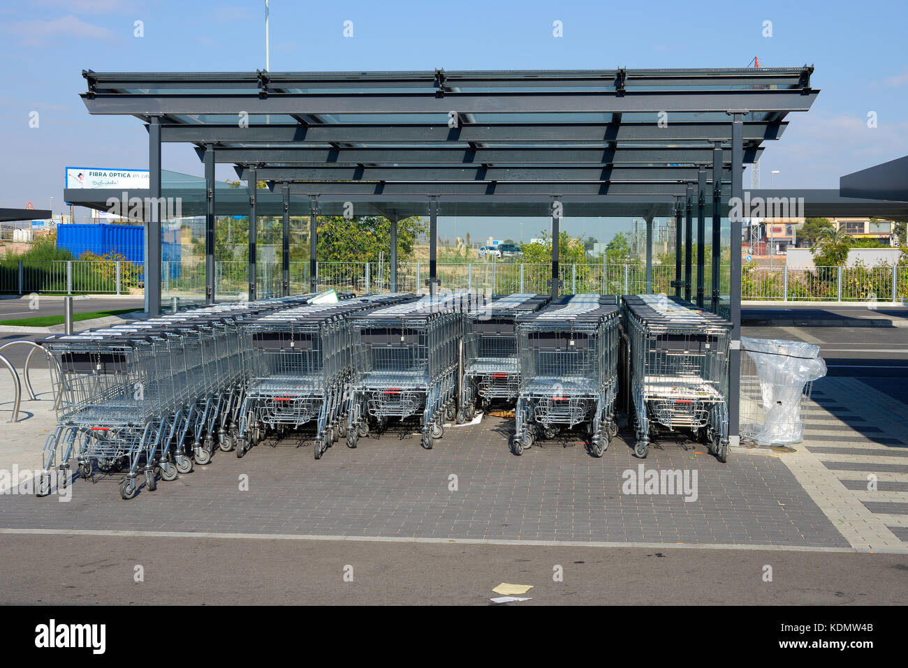 shopping trolleys or carts in a store trolley park very small lidl very plain