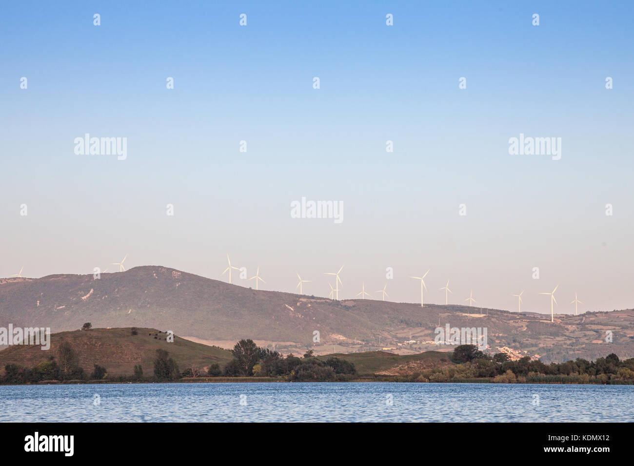 Romanian Wind Farm with Wind Turbines and windmills facing the Danube river, in the Iron Gates valley. Due to the heavy winds in the gorges, it has be Stock Photo