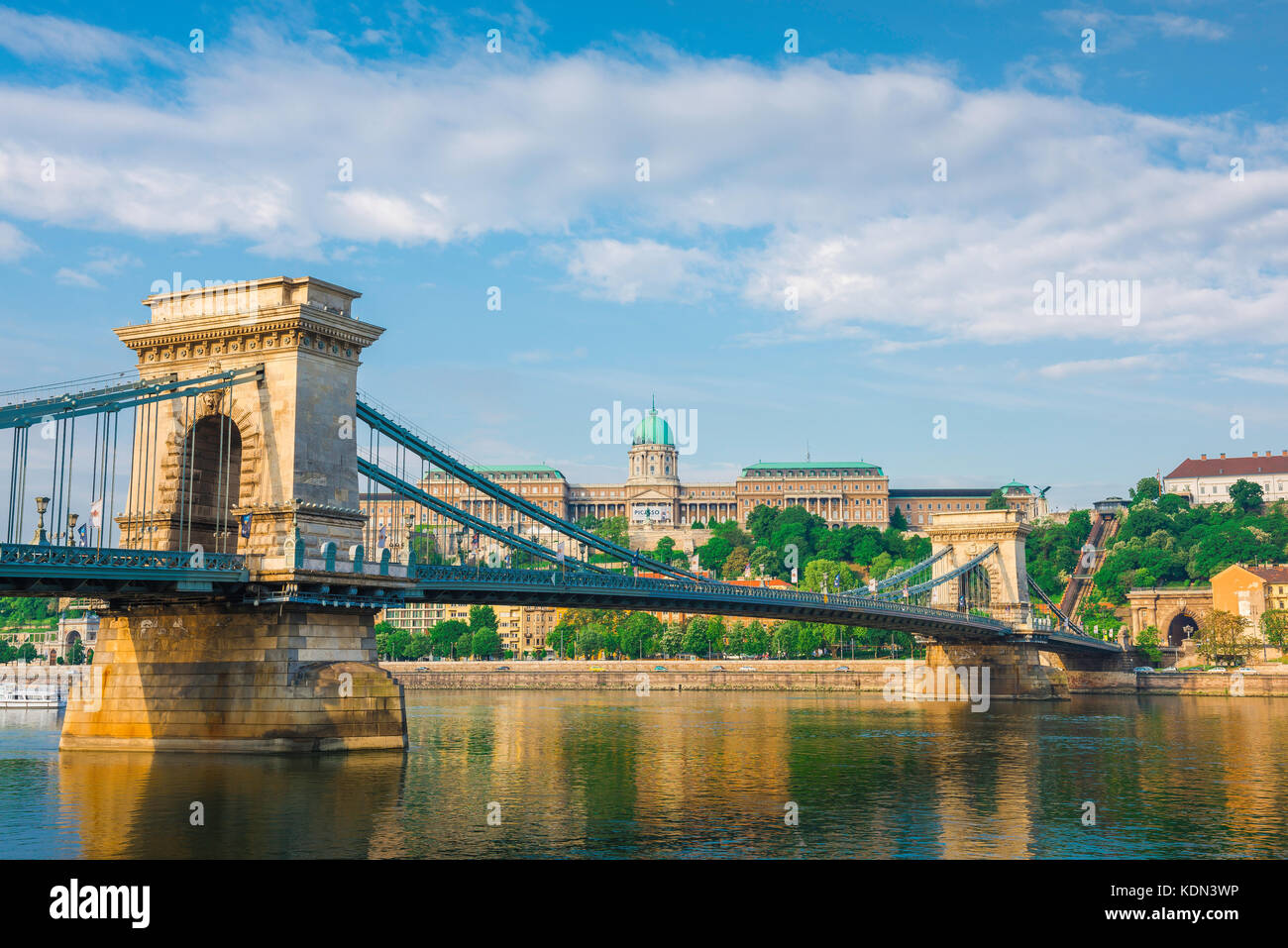 Budapest city view, view of the Royal Palace sited on Castle Hill with the Chain (Lanchid) Bridge in the foreground. Stock Photo