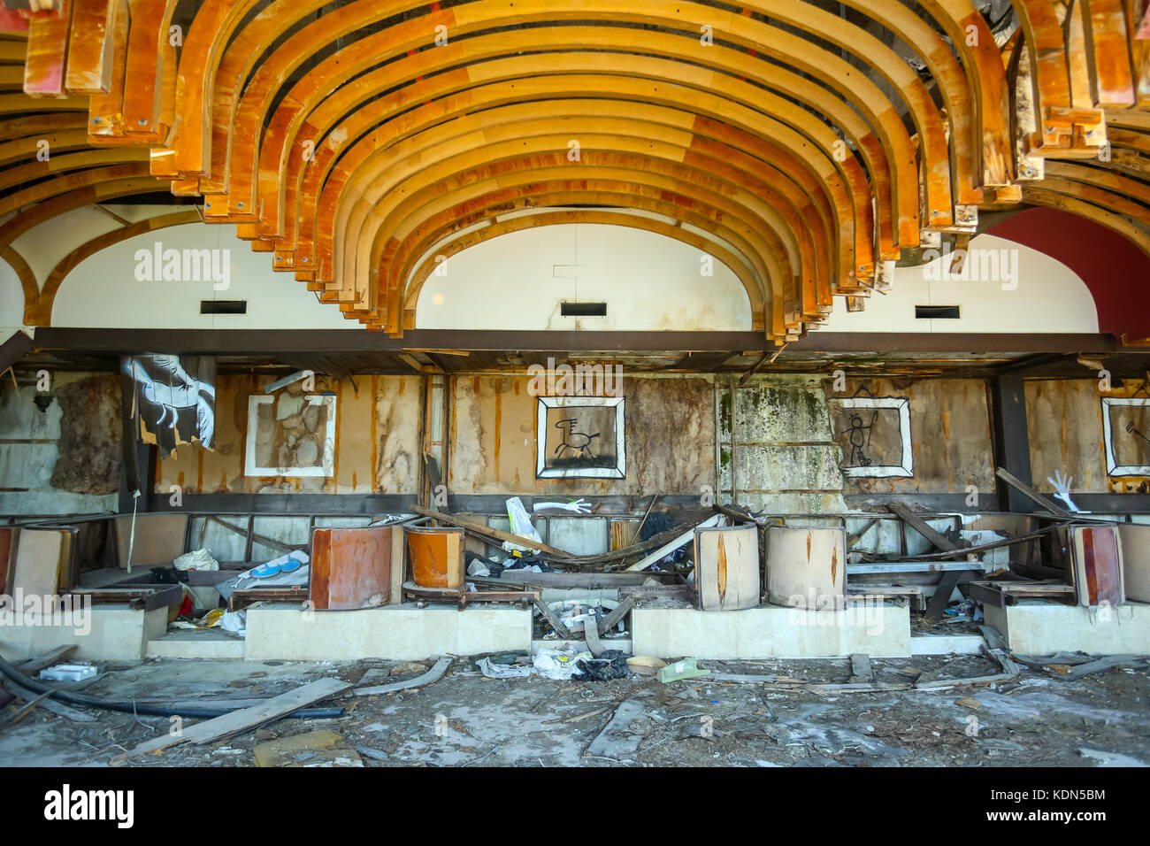 KUPARI, CROATIA - JULY 19, 2017 : Devastated coffee shop of an old ruined hotel Goricina in abandoned Yugoslavian military resort in Kupari, Croatia. Stock Photo