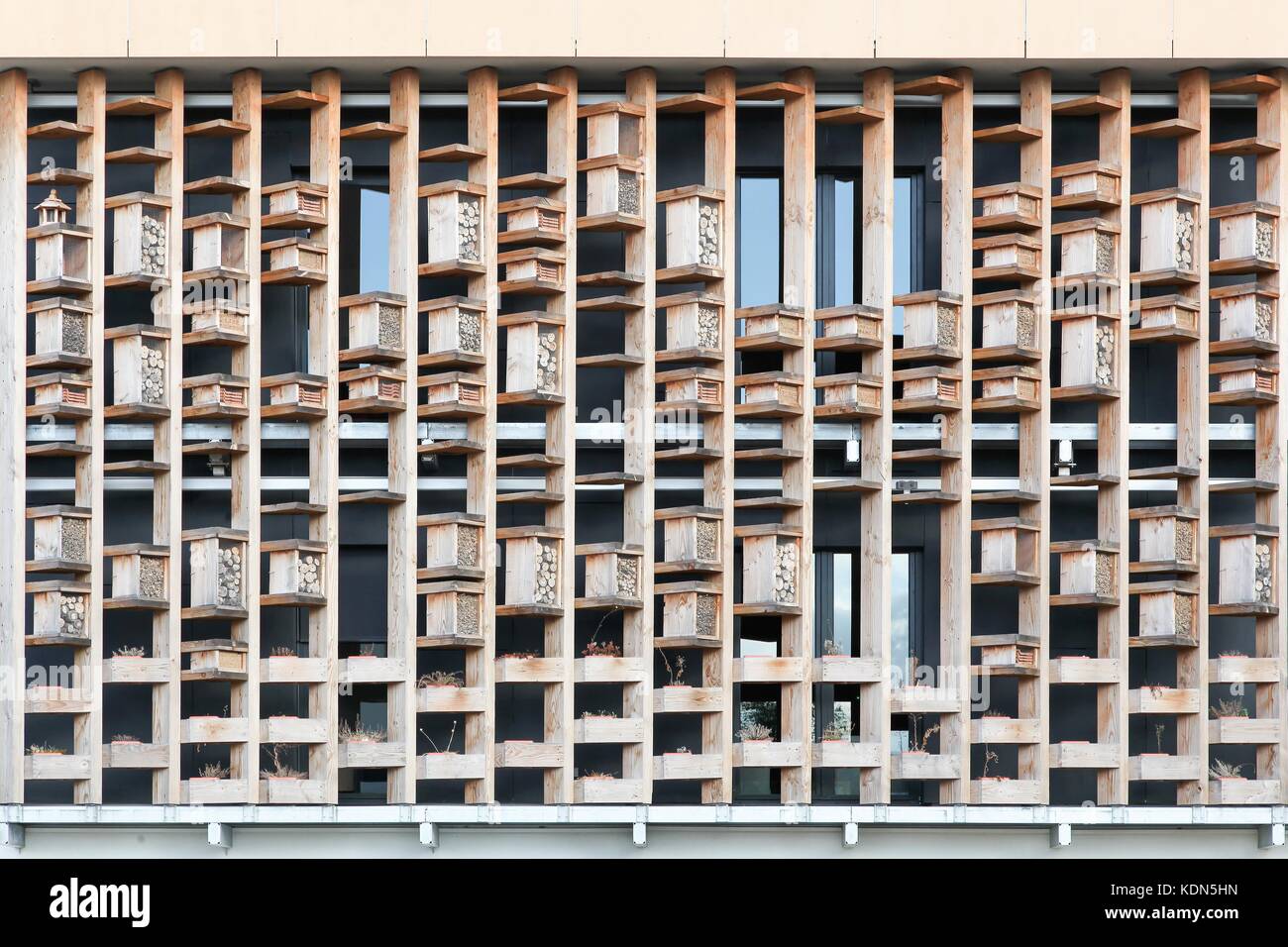 Insect Hotels on a wall of a building Stock Photo