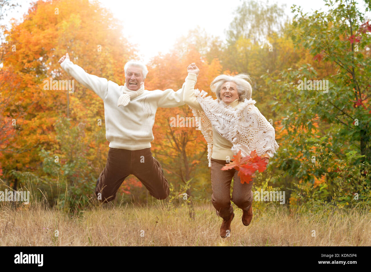 portrait of beautiful caucasian senior couple having fun in park Stock ...