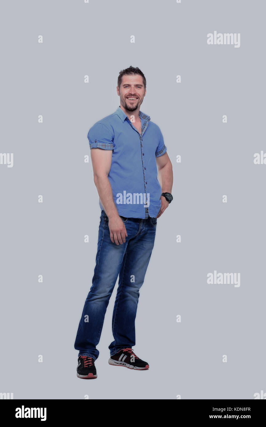 Handsome young man smiling full length on white background Stock Photo ...