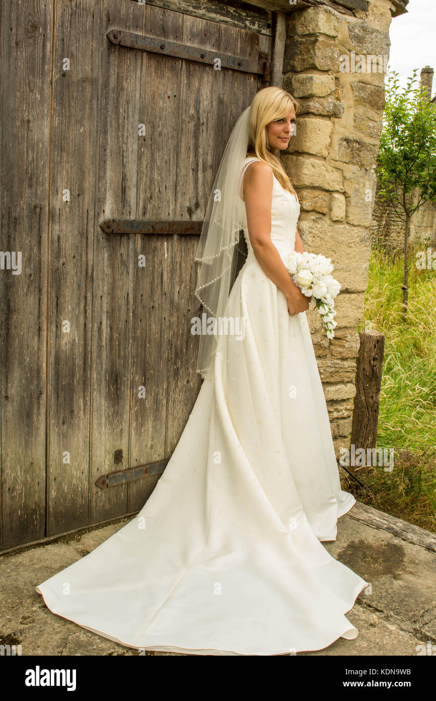 Bride in wedding dress Stock Photo - Alamy