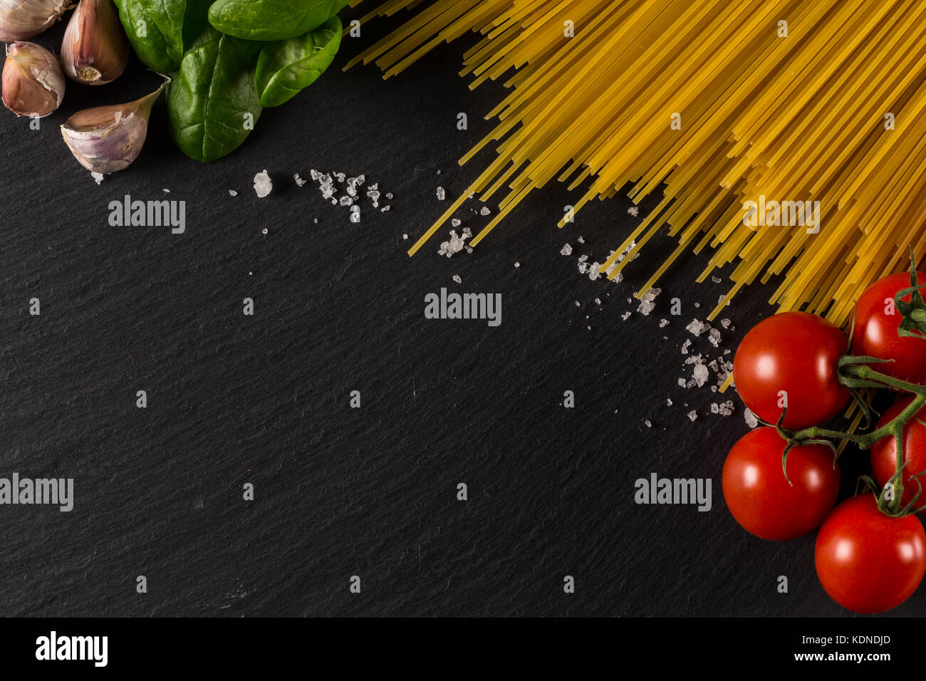 Food frame photo. Pasta ingredients. Cherry-tomatoes, spaghetti pasta ...