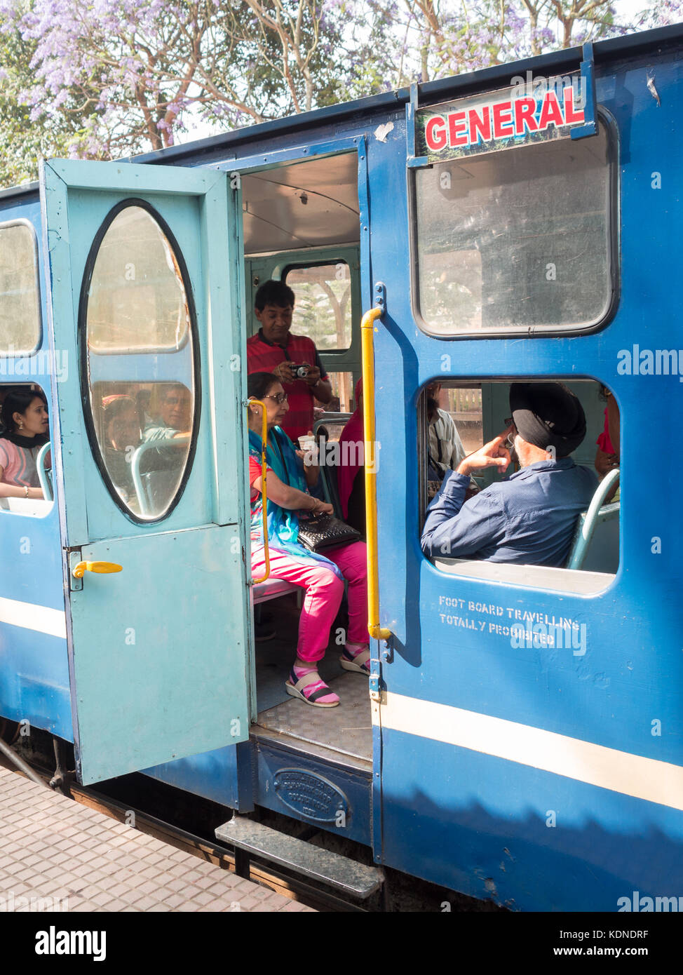 Boarding Nilgiri Toy Train in Coonoor train station Stock Photo