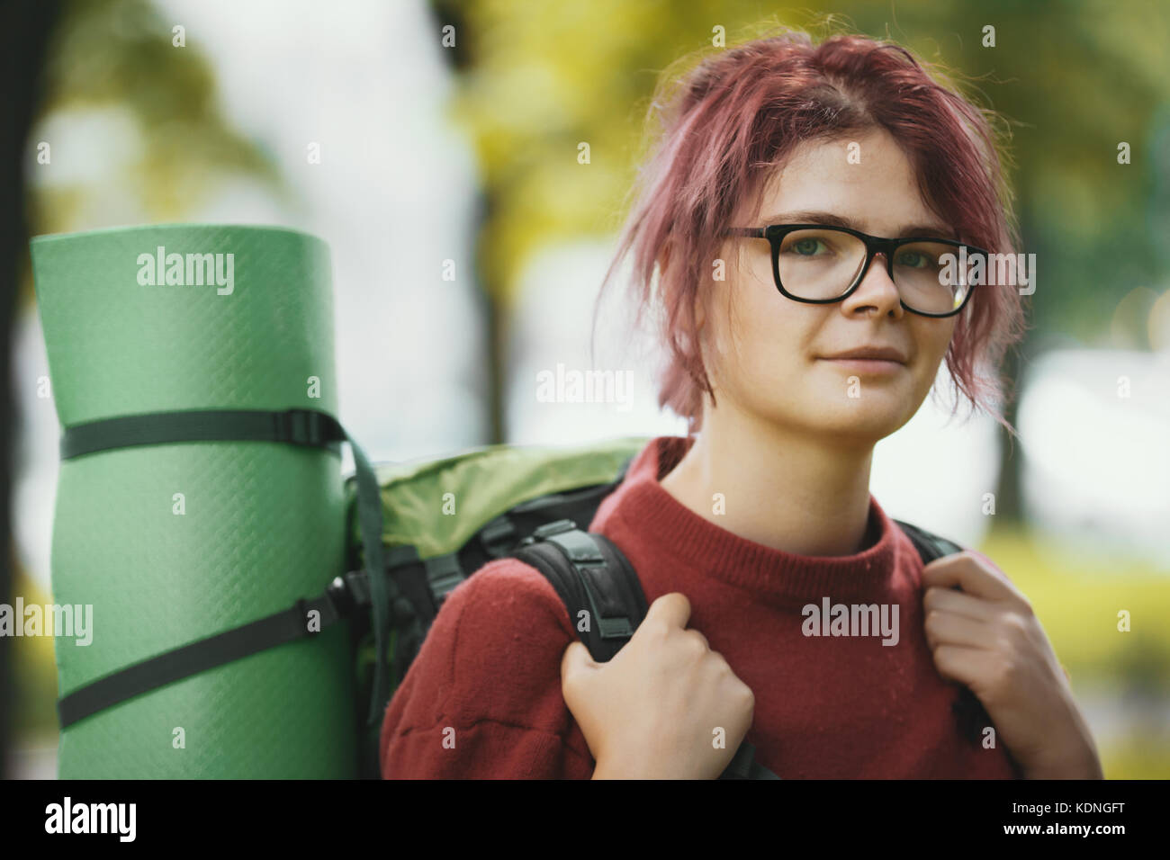 Portrait of a girl teenager tourist with backpack outdoor Stock Photo