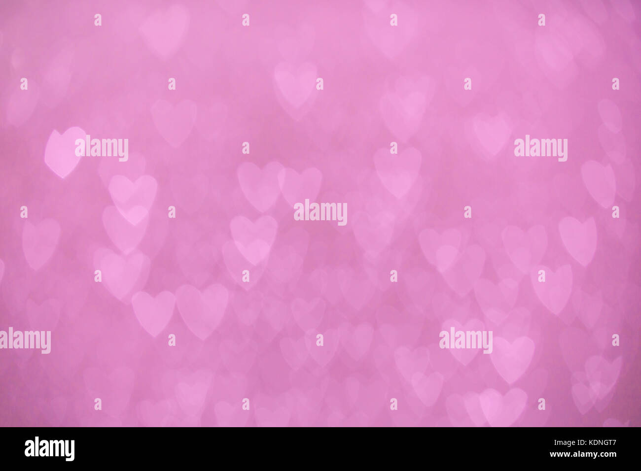defocused lights bokeh background of pink hearts Stock Photo - Alamy