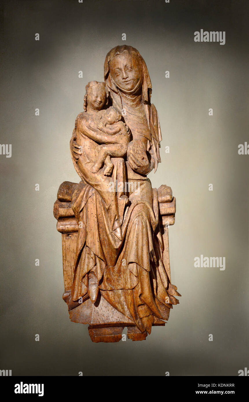 Wood-carving sculpture of st Anna with the Virgin and Child. Bohemia (Czech Republic). 14th century Stock Photo