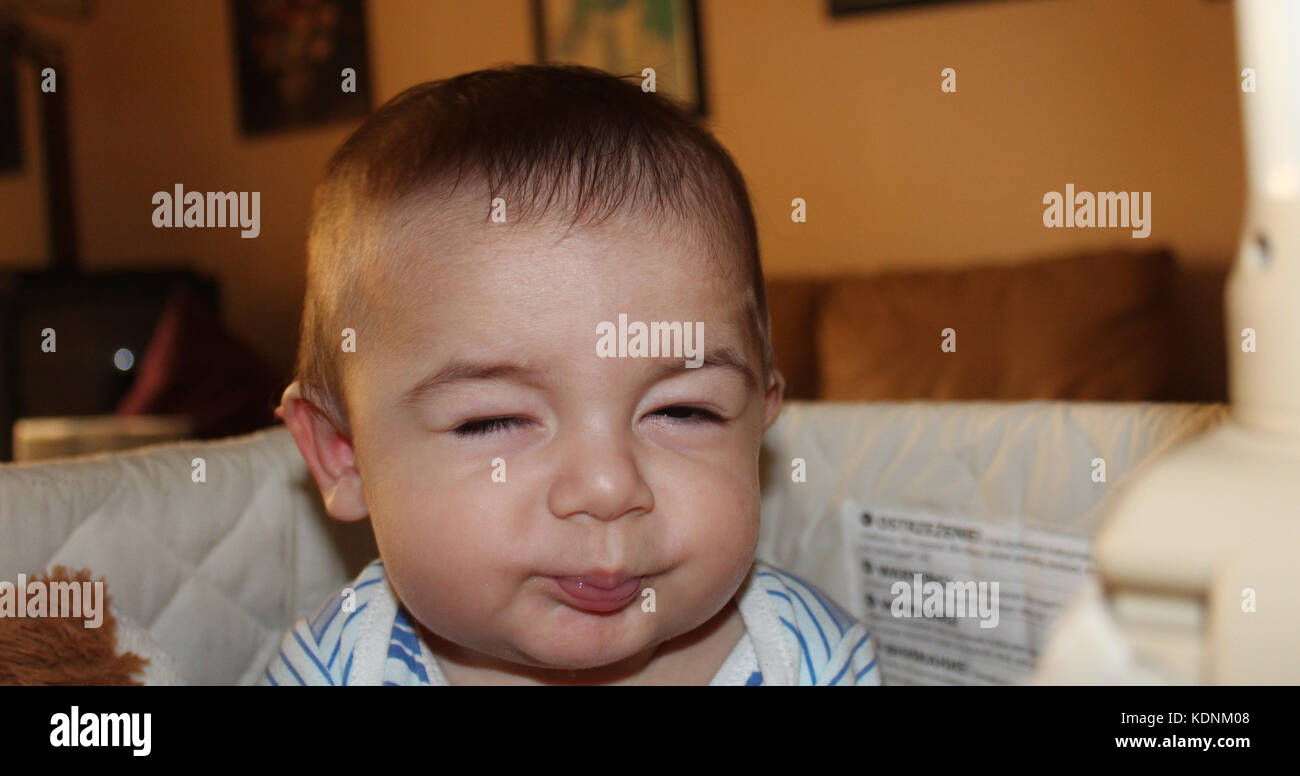 five months old baby boy in the cot Stock Photo Alamy
