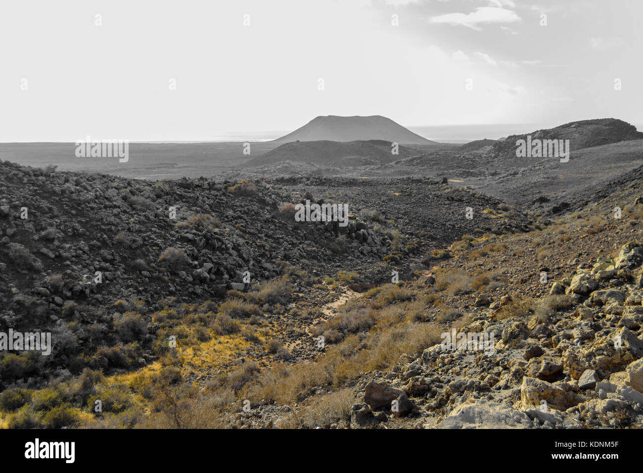 volcanoes between the arid land of Fuerteventura,  Canary Islands, Spain Stock Photo